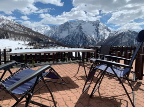 Monolocale con terrazzo e vista spettacolare sui monti